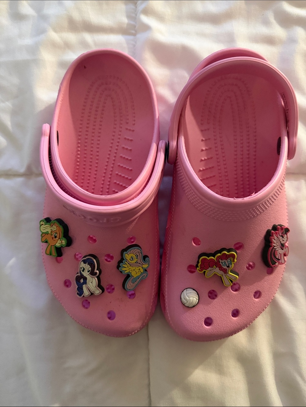 CROCS Pink Clogs with Character Jibbitz